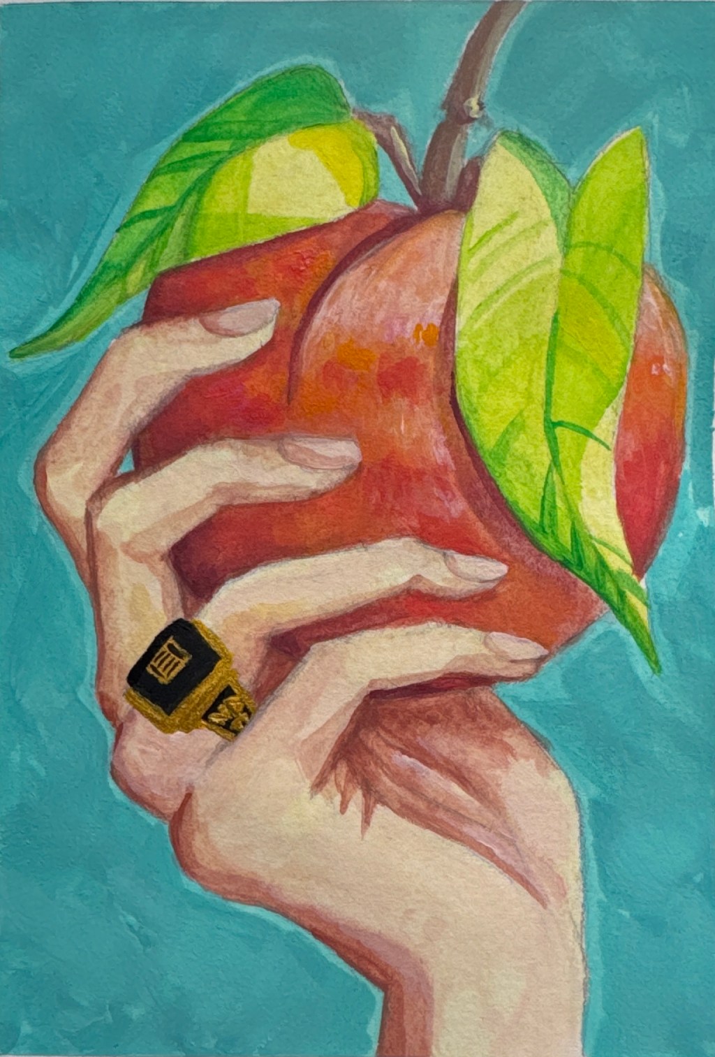 Hand with gold ring and&nbsp;peach